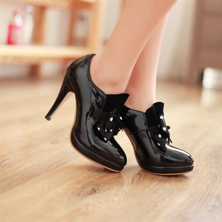 black high heels with bow on front