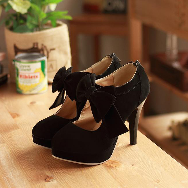 black heels with bow on front